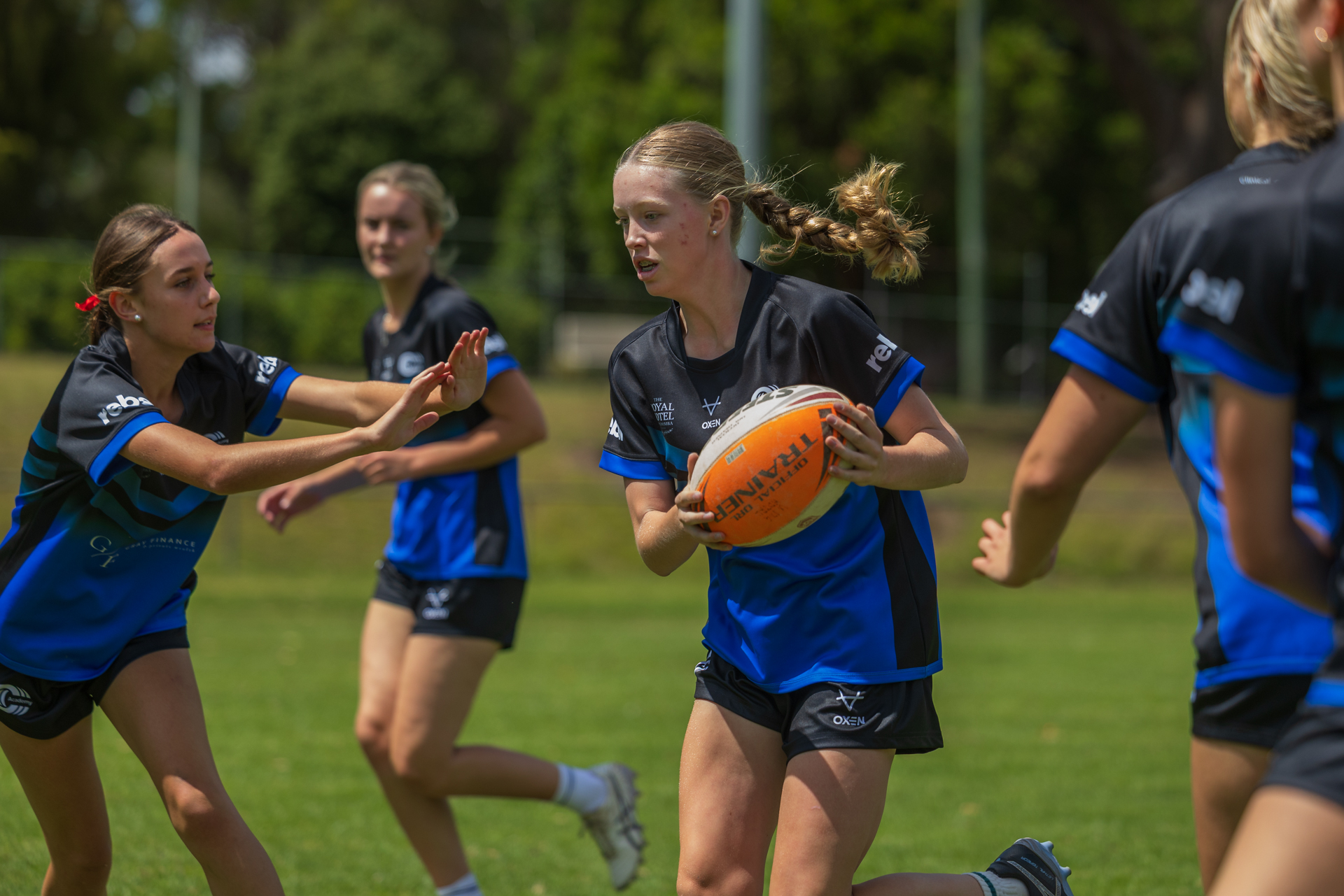 Girls playing rugby league drill